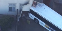Image: An AC Transit bus crashing into a home in Oakland Friday afternoon, injuring eight, the California Highway Patrol said.