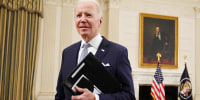 Image: President Joe Biden leaves after speaking about the December jobs report on Jan. 7, 2022.