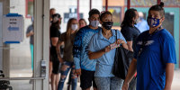 Image: People line up to vote at a polling place in Phoenix on Nov. 3, 2020.