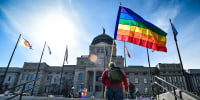 Demonstrators gather on the steps of the Montana State Capitol protesting anti-LGBTQ+ legislation in Helena, on March 15, 2021.