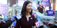 Boston mayoral candidate Michelle Wu speaks with the media after casting her ballot on Election Day in Boston on Sept. 14, 2021.