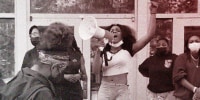 Image: Howard University freshman Kymora Olmo protests the conditions at some of the resident halls on campus.