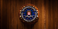 A crest of the Federal Bureau of Investigation is on Aug. 3, 2007 inside the J. Edgar Hoover FBI Building in Washington, DC.