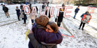 Image: People react to the outcome in the manslaughter trial of Kimberly Potter outside the Hennepin County Courthouse in Minneapolis on Dec. 23, 2021.