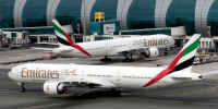Image: FILE PHOTO: Emirates Boeing 777 planes at Dubai International Airport