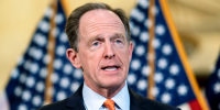 Sen. Pat Toomey, R-Pa., the ranking member of the Senate Banking Committee, tells reporters that Republicans will boycott a vote scheduled for today on confirming President Joe Biden's nominees to the Federal Reserve, including the confirmation of Jerome Powell to a second term as chairman, outside a GOP strategy meeting at the Capitol on Feb. 15, 2022.