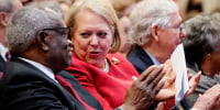 Associate Supreme Court Justice Clarence Thomas sits with his wife and conservative activist Virginia "Ginni" Thomas October 21, 2021 in Washington, DC.