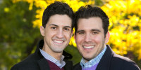 Corey Briskin and Nicholas Maggipinto stand for a portrait outdoors