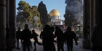 Palestinians clash with Israeli security forces at the Al Aqsa Mosque compound in Jerusalem's Old City on Friday, April 15, 2022.