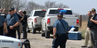 Three deputies were injured and a suspect was killed during a shooting Friday in Kansas, officials said.