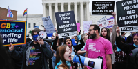 Demonstrators gather in front of the Supreme Court on May 3, 2022.
