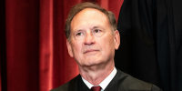 Associate Justice Samuel Alito sits during a group photo of the Justices at the Supreme Court in Washington, DC, on April 23, 2021.