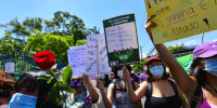 Women protest the Legislative Assembly in San Salvador