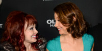 Ashley Judd, right, and her mother Naomi Judd arrive at the Los Angeles premiere of "Olympus Has Fallen" on March 18, 2013.