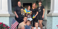John and Lisa Monaco, self-described "empty nesters," opened their Tampa home in April to Masha and Vladimir Halytska and the couple's three children. "Now we have toys and strollers and shoes all over the place," John said. "I love it!"