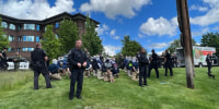 Police in Coeur d'Alene, Idaho, detain people pulled Saturday, June. 11, 2022, from a U-Haul truck near the city's Pride celebration.