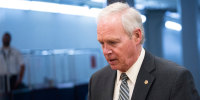 Sen. Ron Johnson walks through the Senate subway to the Capitol, on June 22, 2022.