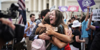Anti-abortion advocates celebrate in front of the Supreme Court on June 24, 2022.