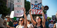 Demonstrators march during an abortion rights rally