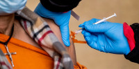 A health worker administers a Covid-19 vaccination in Los Angeles on Jan 7, 2022.