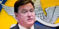 Republican attorney general candidate Todd Rokita speaks during a news conference in Indianapolis.
