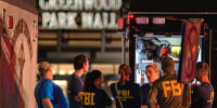 Image: FBI agents gathered outside the Greenwood Park Mall.