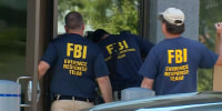 FBI Evidence Response Team gather evidence at the FBI building in Cincinnati on Thursday.