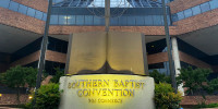 A cross and Bible sculpture outside the Southern Baptist Convention headquarters in Nashville, Tenn., on May 24, 2022.