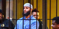 Officials escort Adnan Syed from the courthouse following the completion of the first day of hearings for a retrial in Baltimore on Feb. 3, 2016.