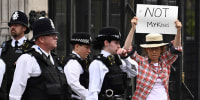 An anti-monarchist protester outside Palace of Westminster in London on Sept. 12, 2022.