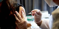 A healthcare worker administers the Moderna Covid-19 vaccination on April 30, 2021, in New York.