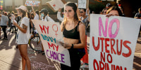 Abortion rights protesters chant during a Pro Choice rally at the Tucson Federal Courthouse in Tucson, Ariz., on July 4, 2022.