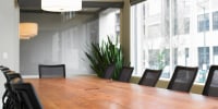 Conference table and chairs in boardroom