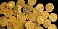 Archaeologists in Israel have found 44 pure gold coins dating back to the Byzantine era, hidden in a wall at a nature reserve.