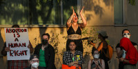 Image: Abortion rights protesters chant during a rally at the Tucson Federal Courthouse on July 4, 2022 in Tucson, Ariz.
