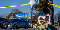 Image: A makeshift memorial outside of a Walmart where six people were fatally shot on Nov. 23, 2022.