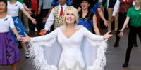 Dolly Parton as herself in Dolly Parton's Mountain Magic Christmas.