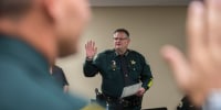 Brevard County Sheriff Wayne Ivey swears in several officers in Titusville, Fla., in 2017.