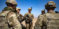 U.S. soldiers attend a joint military exercise between forces of the U.S.-led "Combined Joint Task Force-Operation Inherent Resolve" coalition against the Islamic State (IS) group and members of the Syrian Democratic Forces
