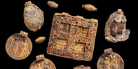 A collection of pendants discovered as part of the necklace. 