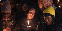 People attend a candlelight vigil in memory of Tyre Nichols at the Tobey Skate Park in Memphis, Tenn., on Jan. 26, 2023.