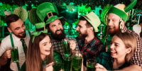 The company of young people celebrate St. Patrick's Day.
