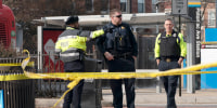 Washington Metropolitan Police officers investigate a shooting at the Potomac Avenue Metro Station in Southeast Washington, Wednesday, Feb. 1, 2023. An armed man shot three people, killing one, Wednesday in a morning rampage that started on a city bus and ended in a Metro tunnel after passengers attacked and disarmed him. (AP Photo/Manuel Balce Ceneta)
