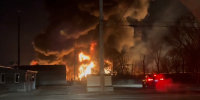 A fire burns in East Palestine, Ohio on Feb. 3, 2023, following a train derailment.