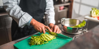 Lettuce Ready, Skilled Asian Chef Cuts Lettuce