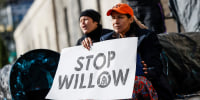 Climate activists protest the Willow Oil Project outside the U.S. Department of Interior on Nov. 17, 2022, in Washington.