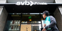 A pedestrian passes a Silicon Valley Bank in San Francisco