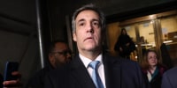 Former Donald Trump lawyer Michael Cohen leaves the courthouse after testifying before a grand jury in New York