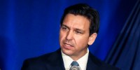 Image: Florida Gov. Ron DeSantis speaks at a New Hampshire Republican Party dinner on April 14, 2023, in Manchester, N.H.