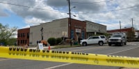 Investigators work at the site of a fatal shooting in Dadeville, Ala.,